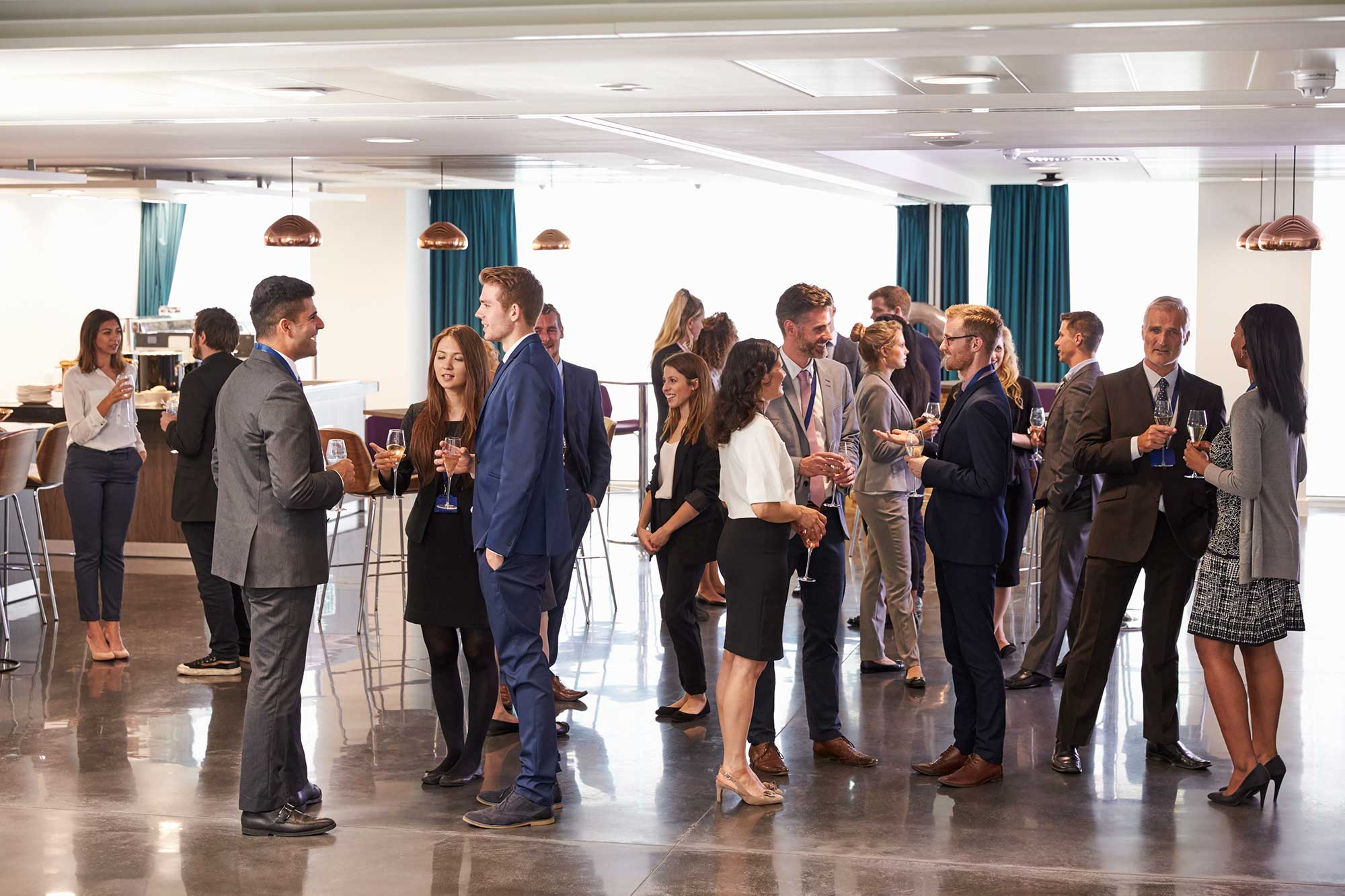 Business professionals networking at a corporate event, creating connections, and discussing future opportunities